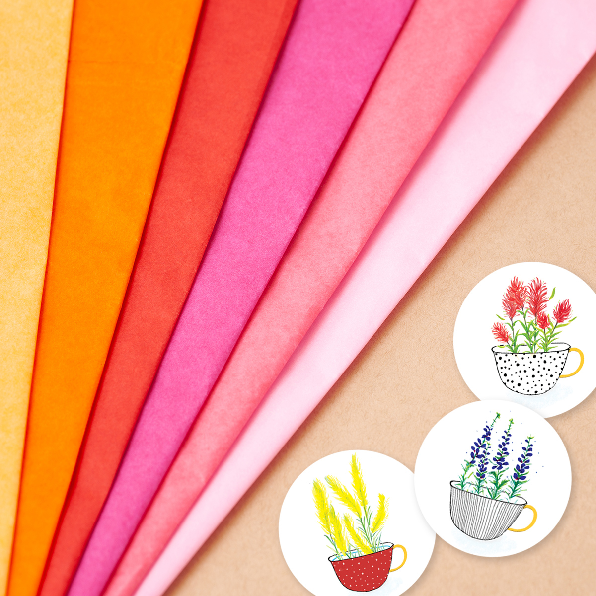 image shows tissue paper in branded colors next to flower stickers in same branding palette, a great strategy for product packaging using color.