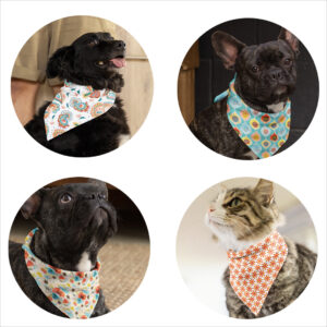 image shows four pets: three dogs and one cat. The dogs are wearing artist inspired dog bandanas and the cat is wearing an artist inspired cat bandana. artist inspired gifts for furry friends. 