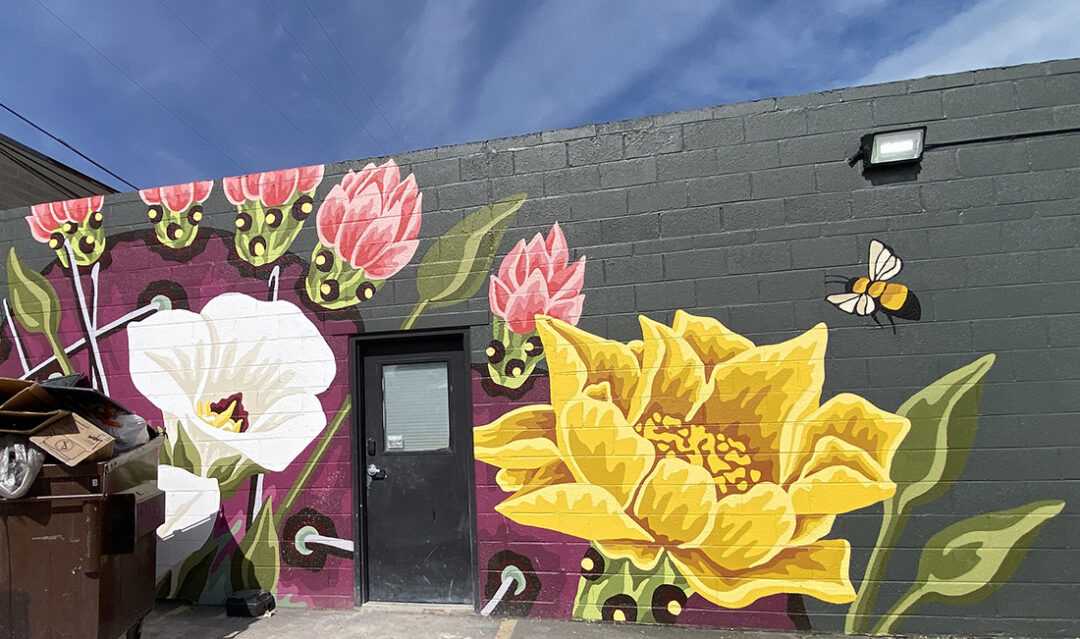 Salt Lake City mural on 2100 South featuring large beautiful cactus flowers.