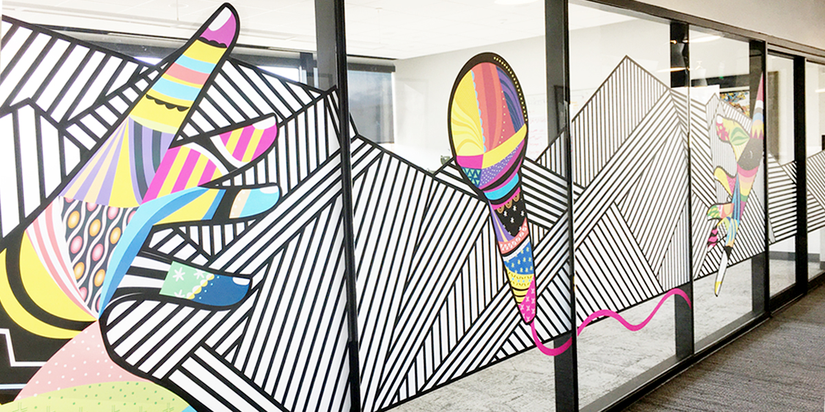 Vinyl mural displays vibrant and crisp artwork displayed at Spy Hop in Salt Lake City, Utah.